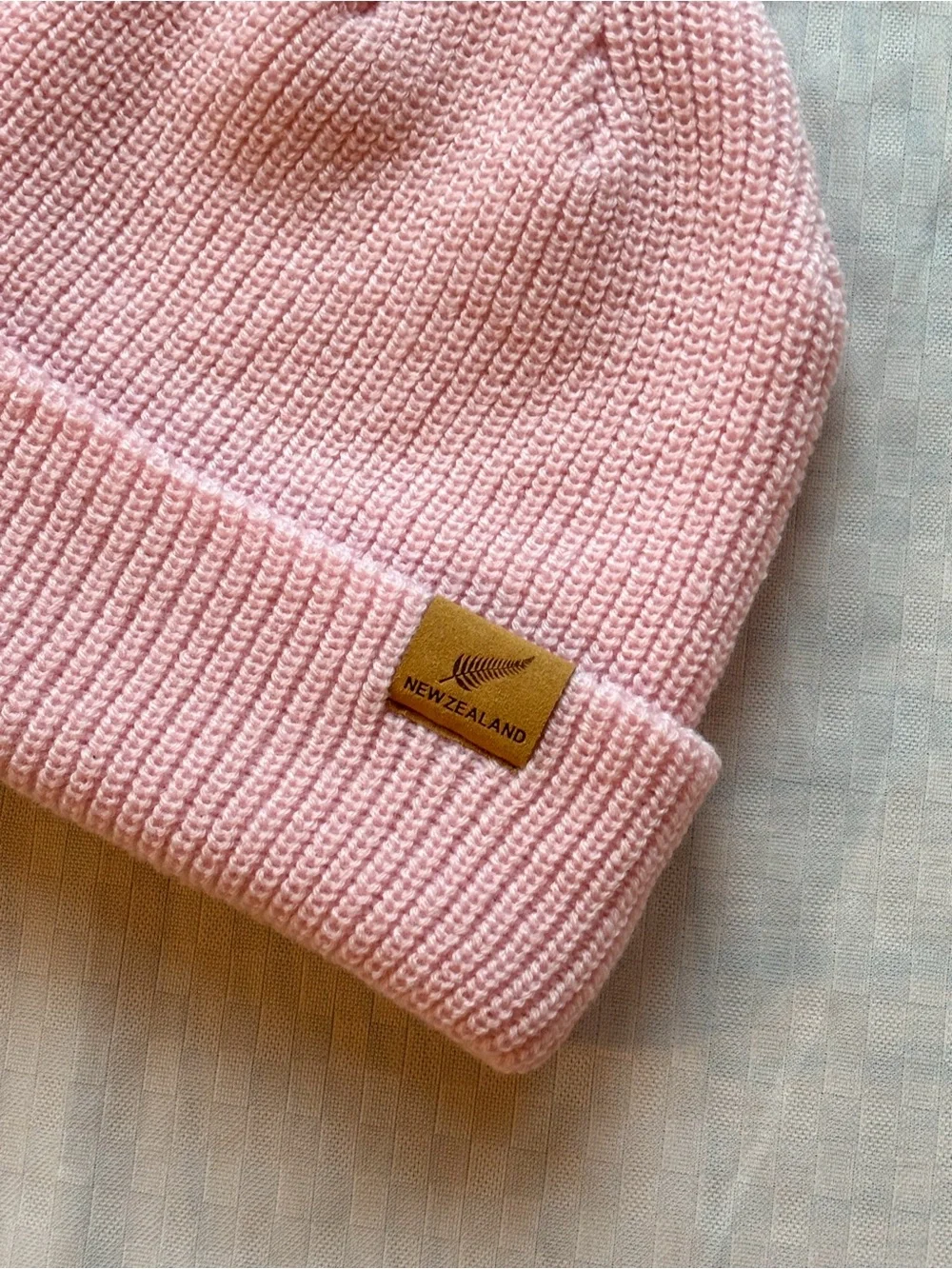 Baby pink knit beanie from New Zealand